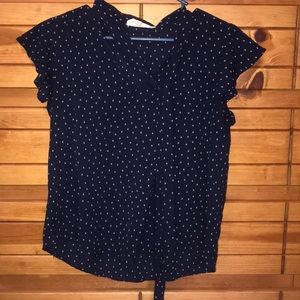Semi low v-neck blouse